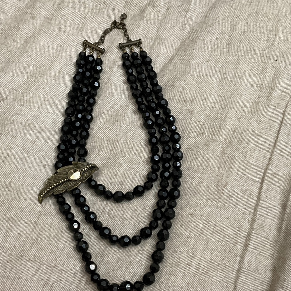 Multi-Strand Black Bead Statement Necklace with Decorative Clasp